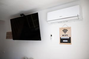 TV a/nebo společenská místnost v ubytování Duplex Apartma Nikolina