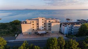 an aerial view of a building next to the water at Crotiria Beach - Aparthotel in Pomorie
