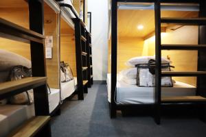 Postel nebo postele na pokoji v ubytování AMANGO HOSTEL