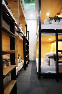 Postel nebo postele na pokoji v ubytování AMANGO HOSTEL