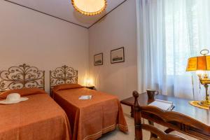 Postel nebo postele na pokoji v ubytování Casa Val di Sogno - Happy Rentals + 26 fotografií