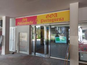 a store front with a sign above the doors at White Sage - Gorgeous Apartment in JLT Near the Metro Station in Dubai
