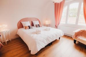 Postel nebo postele na pokoji v ubytování AU COIN DE PARADIS - Suite plume d'ange