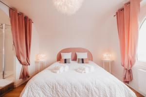 Postel nebo postele na pokoji v ubytování AU COIN DE PARADIS - Suite plume d'ange