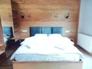 Letto o letti in una camera di Mestia Roots