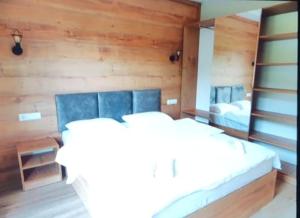 Letto o letti in una camera di Mestia Roots