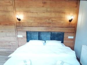 Letto o letti in una camera di Mestia Roots