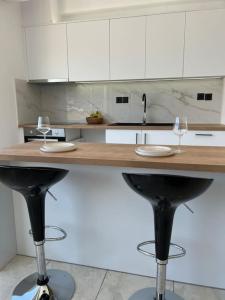 Kuchyň nebo kuchyňský kout v ubytování Elounda Port Apartment