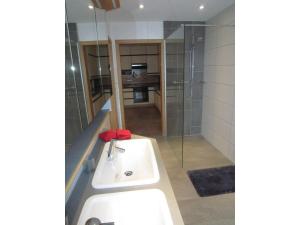 a bathroom with a sink and a shower at Haus Brunner in Grafenhausen