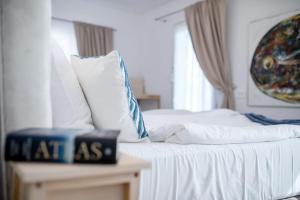 Ένα ή περισσότερα κρεβάτια σε δωμάτιο στο Villa Fjaka Rab