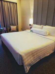 Postel nebo postele na pokoji v ubytování Sunway Hotel Georgetown Penang