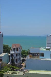 a view of the ocean from a building at Gia Hoang Hotel in Quy Nhon
