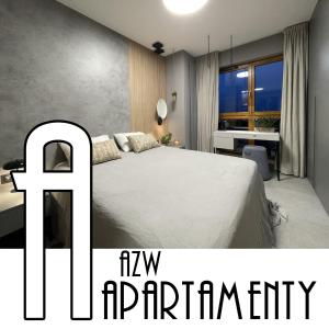 a bedroom with a bed and a room with a window at Aggi - Apartament Premium z widokiem na morze - AZW Gdańsk in Gdańsk