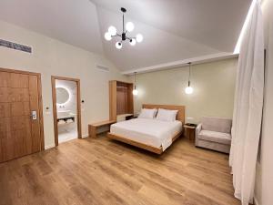 Postel nebo postele na pokoji v ubytování Elpis Guest House