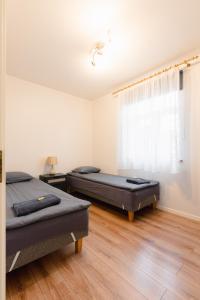 Postel nebo postele na pokoji v ubytování Posti Guesthouse