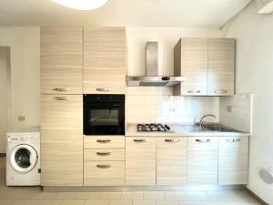 Kuchyň nebo kuchyňský kout v ubytování Vittoria Apartament