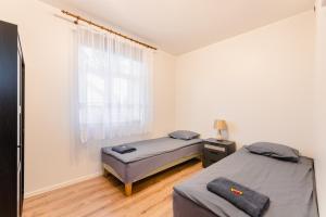 Postel nebo postele na pokoji v ubytování Posti Guesthouse