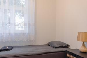 Postel nebo postele na pokoji v ubytování Posti Guesthouse