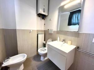 Koupelna v ubytování Vittoria Apartament