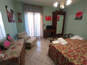 Postel nebo postele na pokoji v ubytování I Fiori di AminA