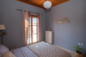 Posteľ alebo postele v izbe v ubytovaní Studio Dionphaie - Διόνφαιη