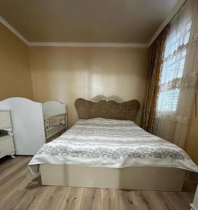 Postel nebo postele na pokoji v ubytování Agro Guest House Tsiskari in Machakhela