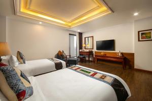 TV a/nebo společenská místnost v ubytování Bamboo Sapa Hotel
