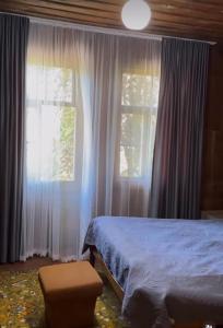 Postel nebo postele na pokoji v ubytování Agro Guest House Tsiskari in Machakhela