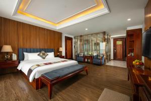 Postel nebo postele na pokoji v ubytování Bamboo Sapa Hotel