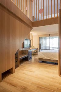 Ένα ή περισσότερα κρεβάτια σε δωμάτιο στο Kilin Hotel, JiaoXi