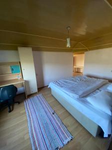 Un pat sau paturi într-o cameră la Villadem