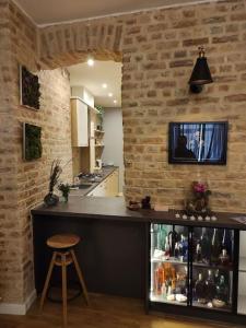 Køkken eller tekøkken på Уютный лофт среди старых парков