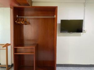 TV a/nebo společenská místnost v ubytování Citi Place Hotel ซิตี้ เพลส
