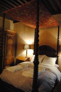 Postel nebo postele na pokoji v ubytování Chateau de Montchoisy