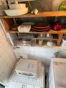 Virtuvė arba virtuvėlė apgyvendinimo įstaigoje 経堂の小さな一棟貸wakusei