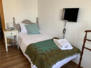 Postel nebo postele na pokoji v ubytování Sueca 1