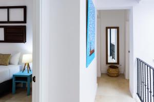 Posteľ alebo postele v izbe v ubytovaní Casa de los Venerables