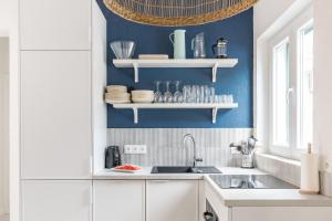 Kuchyň nebo kuchyňský kout v ubytování Apartments Marina