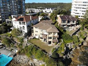 an aerial view of a house at Waterfront on Manly Harbour in Sydney