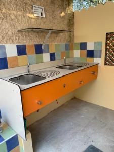 A kitchen or kitchenette at Camping l'Olivier Junas