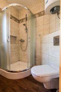 Kúpeľňa v ubytovaní Apartamenty Tatra View Kościelisko