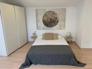 Posteľ alebo postele v izbe v ubytovaní La Pau Apartaments