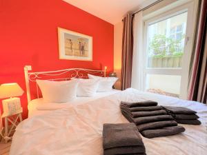 Katil atau katil-katil dalam bilik di Villa Strandperle 02 - Souterrain