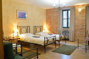 Posteľ alebo postele v izbe v ubytovaní Hotel Via Ironia