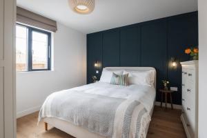 Ένα ή περισσότερα κρεβάτια σε δωμάτιο στο Apartment 11, Silver Cove