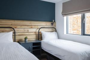 Ένα ή περισσότερα κρεβάτια σε δωμάτιο στο Apartment 12, Sunny Cove