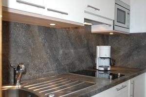 A kitchen or kitchenette at Appartements Vilsalp