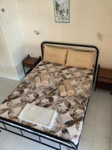 Postel nebo postele na pokoji v ubytování Polyxenis Rooms