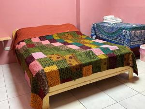 Postel nebo postele na pokoji v ubytování 藏夫私廚的家