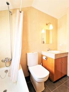 a bathroom with a toilet and a sink and a shower at AA Guest - Salinas Paradise Terrace Eco Apartment in Fuengirola